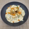 Emincé de poulet, crème de gingembre, carottes rôties, riz et noix de Cajou