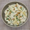 Pâtes au gorgonzola, noix, parmesan et oignons nouveaux