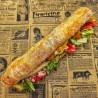 Sandwich César : poulet pané, sauce césar, parmesan, tomate, salade